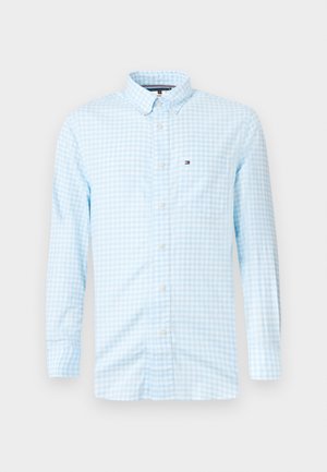 Lichtblauw geruit overhemd met knopen, gemaakt van katoen, met een spread collar en lange mouwen; bevat een klein logo op de borstzak.