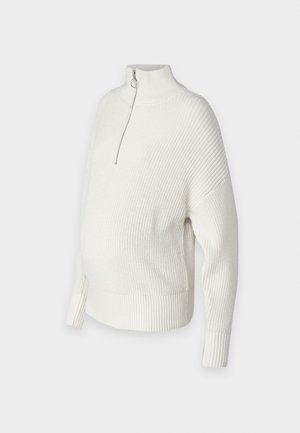 Witte, gebreide trui met een hoge kraag, halve rits en geribde manchetten. Ontworpen met een losse pasvorm en zijsplitten voor extra comfort.