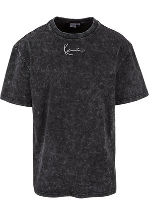 Black distressed t-shirt made of cotton, featuring a round neckline and short sleeves. Includes a white logo printed on the chest.