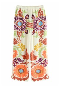 Pantaloni larghi e leggeri con uno sfondo crema. Presentano motivi floreali e geometrici vivaci in arancione, viola, verde e blu.