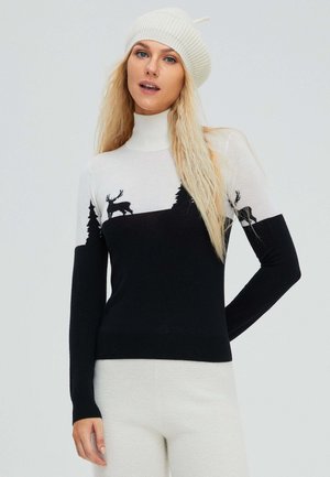 Schwarz-weißer Rollkragensweater mit Silhouetten von Rehen und Kiefern, aus weichem Stoff, mit figurbetontem Design und langen Ärmeln.