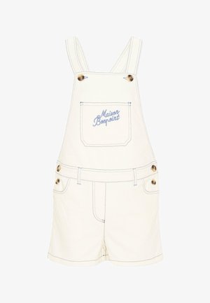 Salopette courte en denim blanc avec coutures bleues, boutons métalliques, poche poitrine avant brodée de "Maison Bonpoint".