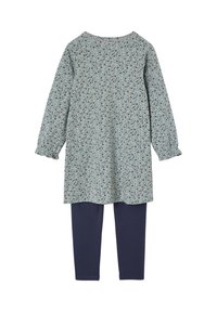 Blumen-Tunika in Mintgrün mit langen Ärmeln und rundem Ausschnitt, kombiniert mit marineblauen Leggings. Beide bestehen aus weichem, atmungsaktivem Stoff.