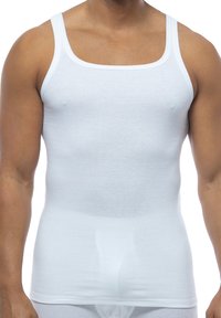 White tank top made of cotton fabric, featuring a square neckline, broad straps, and a snug fit. Minimalistic design with no patterns.
