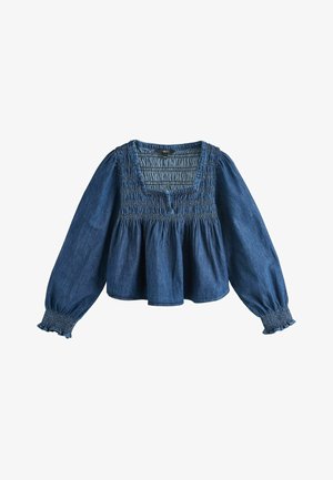 Langærmet blå denimbluse med smocket firkantet halsudskæring, indsnævret talje og elastiske flæsekantede manchetter.