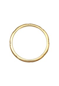 Guldfärgad armbågsarmband med en slät, rund form och präglade blommönster runt bandet. Polerad metallyta med glänsande finish.