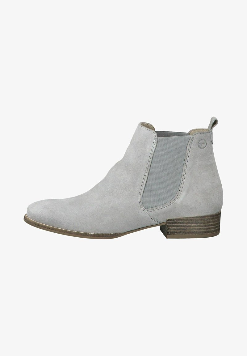 Bottine en cuir suédé gris clair avec panneau latéral élastique, petit talon en bois empilé, bout rond et languette à l'arrière.