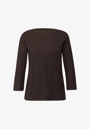 Brązowy prążkowany top z długim rękawem, okrągłym dekoltem i lekko rozszerzanym dołem. Wykonany z teksturowanego materiału o gładkim wykończeniu.