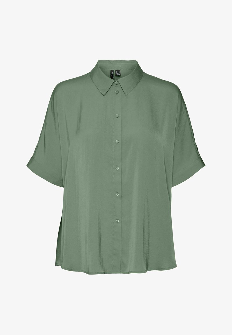 Chemise à manches courtes ample en vert doux avec col classique et sept boutons sur le devant.