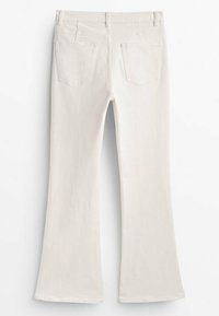 Witte, uitlopende spijkerbroek van katoen-denim. Beschikt over een hoge taille, vijfzakken ontwerp, met zichtbare stiksels en een gladde textuur.