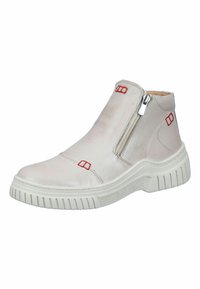 White leather ankle boot with a side zipper, red accents, textured white sole, and a sleek, rounded toe design.