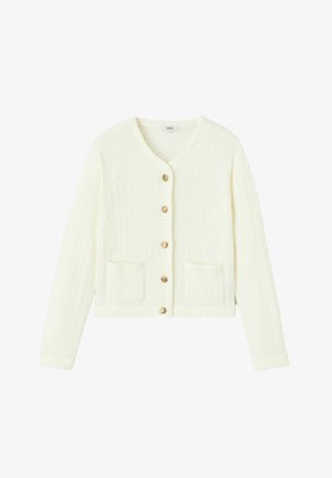 Cardigan blanc court en tissu texturé, avec encolure en V, boutons dorés, et deux poches frontales. Poignets de manches et ourlet côtelés.