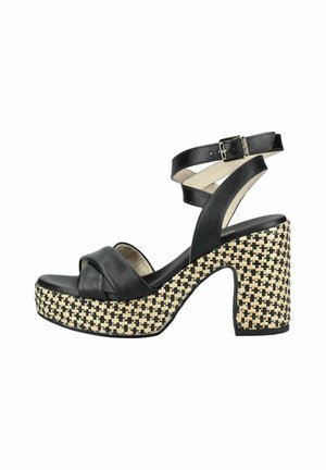 Sort læder højhælet sandal med tyk flettet beige og sort platformsål og ankelrem med spænde.