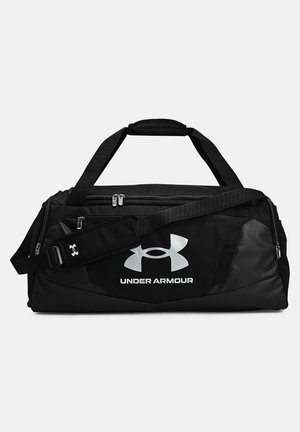 Sac de sport noir Under Armour avec sangle d'épaule réglable, compartiments à double fermeture éclair et logo sur la poche avant.