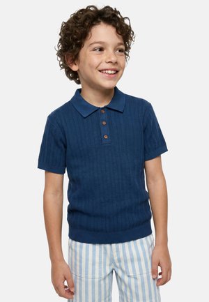 Monoprix, Polo - drapeau