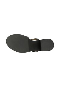Semelle de sandale noire avec zone des orteils texturée et talon lisse, montrant une légère élévation du talon et des points de fixation de la sangle.