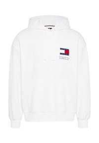 Hoodie bianco con cappuccio regolabile, tasca a canguro, polsini e orlo a costine. Presenta un logo colorato "TOMMY JEANS" sul petto.
