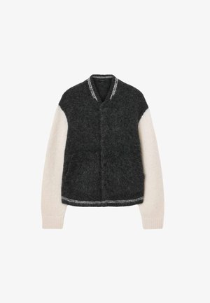 Grijze en romige cardigan gemaakt van een zachte wolmix, met een v-hals, contrasterende mouwen en ribgebreide manchetten. Opvallende grijze streepdetails.