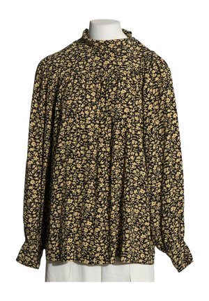 Blouse à manches longues avec petit motif floral noir et beige, col montant et détails froncés sur le devant et les manches.
