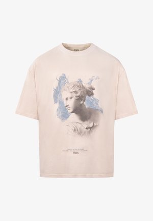 Beżowa, oversize t-shirt z bawełny, z klasycznym nadrukiem popiersia w niebieskich akcentach i tekstem na dole, okrągłym dekoltem oraz krótkimi rękawami.