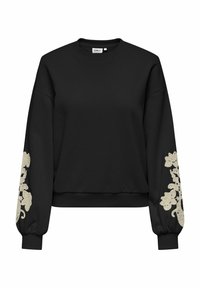 Zwarte sweatshirt met lange, opgeblazen mouwen. Heeft beige bloemenborduursel op de manchetten. De stof lijkt zacht en heeft een relaxte pasvorm.