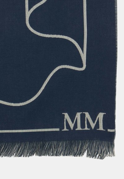 Navyblauwe textieldeken met een wit abstract ontwerp, franjes aan de randen en een opvallend "MM" patroon in de rechterbenedenhoek.