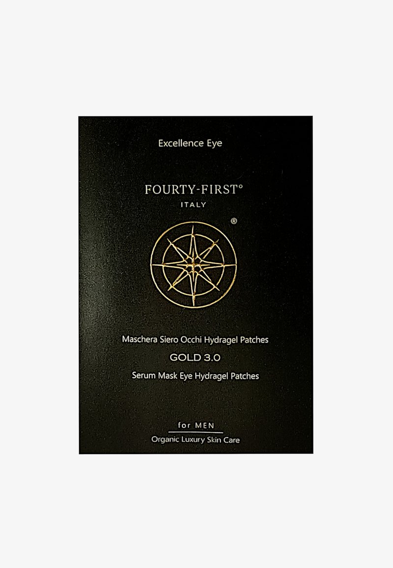 Zwarte verpakking met gouden tekst en een kompasachtig ontwerp. Tekst omvat "Excellence Eye" en "GOLD 3.0." Ontworpen voor huidverzorging voor mannen.