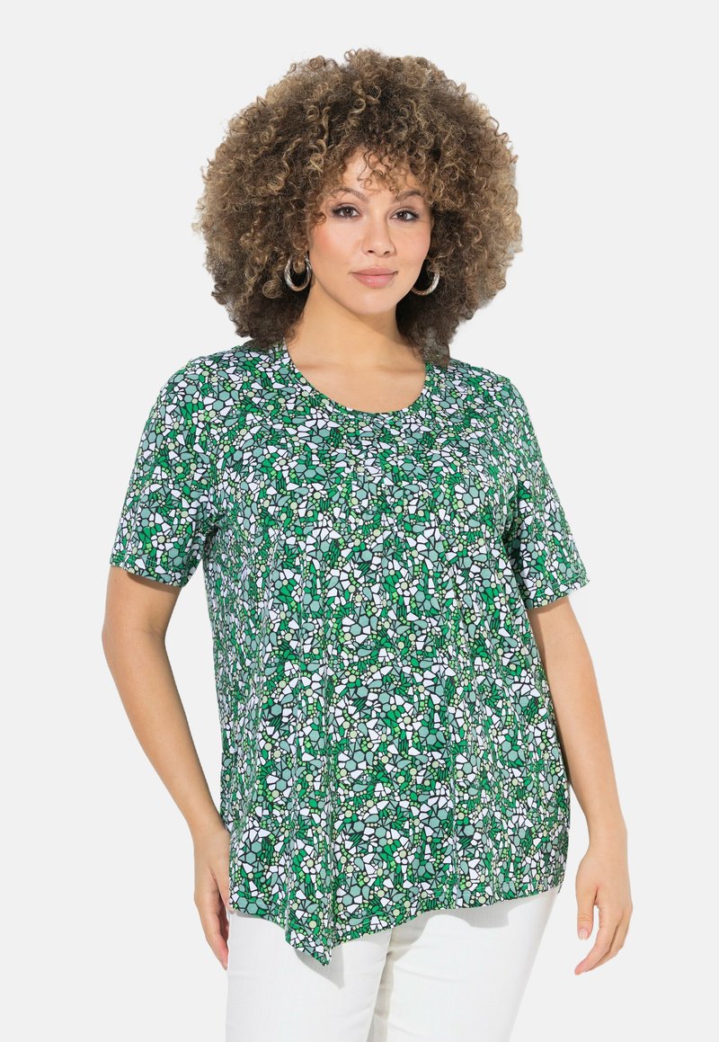 Maglietta a maniche corte con stampa floreale verde e scollo rotondo, realizzata in tessuto leggero, con una vestibilità ampia e orlo arrotondato.