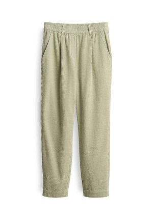 Pantaloni ribbattuti di un verde chiaro, con texture, fondina elastica, due tasche laterali e gamba affusolata. Adatti per un abbigliamento casual.