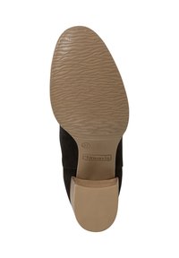 Suela de zapato de ante negro con una suela de goma texturizada. Presenta un acento de tacón beige suave y un logotipo de la marca impreso cerca del tacón. Talla 37.