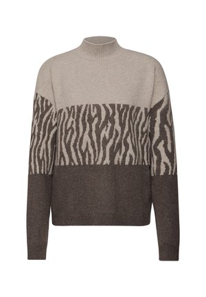 Strikket sweater med høj hals; har beige og mørkebrune striber med et zebra-mønster. Blød tekstur med en løs pasform og lange ærmer.