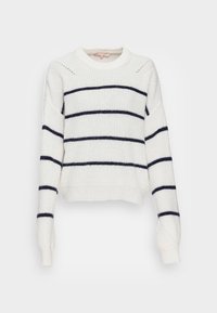 Pull rayé blanc avec des lignes horizontales bleu marine, texture tricotée, encolure ronde et manches amples. Présente des détails de couture latérale.