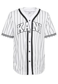 Vit kortärmad baseballtröja med svarta ränder, med knäppning framtill och ordet "KANI" tydligt tryckt i svarta bokstäver.
