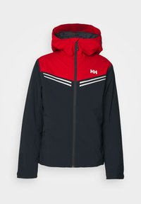Wasserdichte Jacke in Dunkelblau mit roter Kapuze und oberem Abschnitt. Mit weißen horizontalen Streifen und einem Frontreißverschluss. Helly Hansen-Logo angebracht.