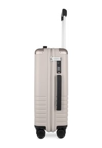 Hartschalenkoffer in hellem Beige mit strukturierter Oberfläche, teleskopischem Griff, Zahlenschloss und vier multidirektionalen Rollen.