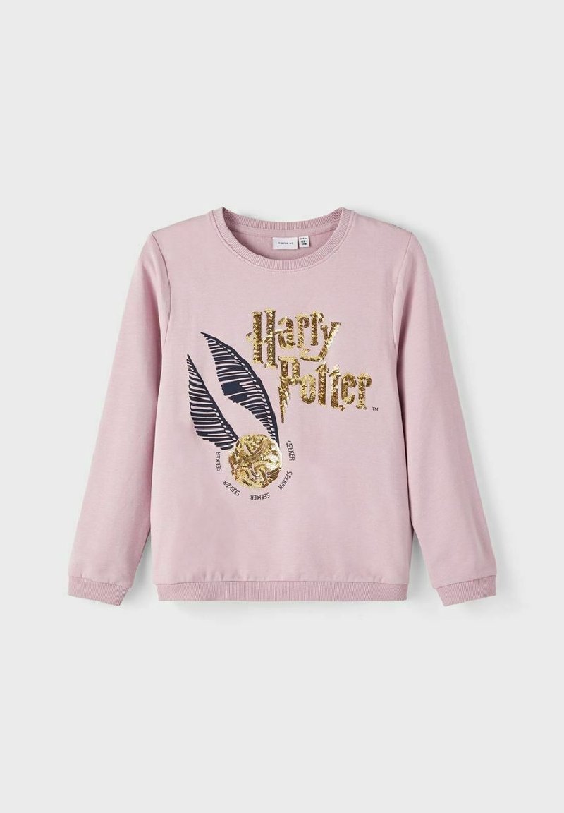 Sweatshirt rose clair à manches longues avec texte doré "Harry Potter", plumes noires et vif d'or doré à sequins étiqueté "Seeker" sur le devant.