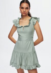 adL FRILLED  - Denní šaty - almond green