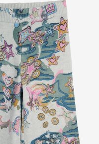 Bunte Leggings mit einem wirbelnden Muster aus abstrakten Formen, Seesternen und Herzen. Hergestellt aus weichem, flexiblem Stoff.