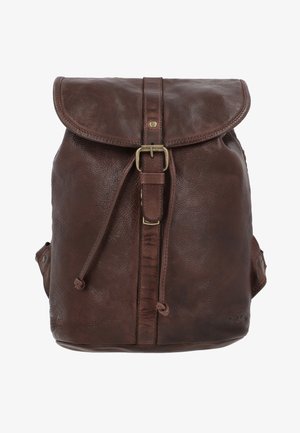 Brown leather backpack with a fold-over flap, brass buckle closure, and drawstring. Textured surface with side pockets and reinforced stitching.