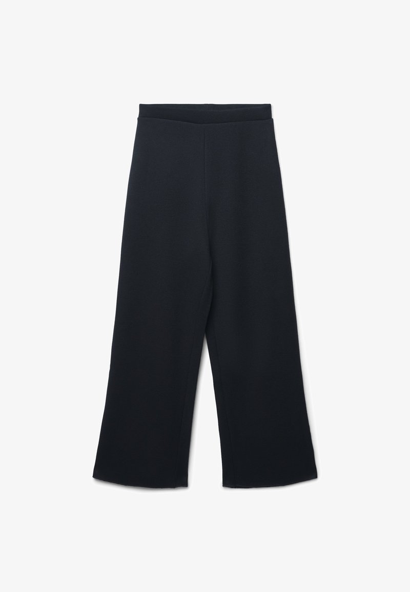 Pantalon large noir avec une taille haute élastique, texture lisse et sans poches visibles ni embellissements.