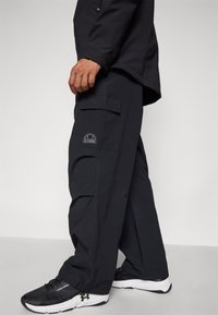 Ellesse BUSTED PANT - Bukse - black