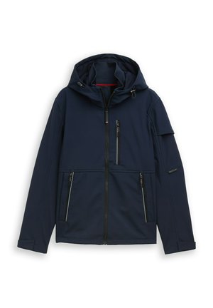 Giacca softshell blu navy con cappuccio, cerniera frontale e molteplici tasche con zip. Tessuto liscio con dettagli a cucitura e caratteristiche regolabili.