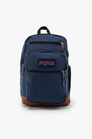 Navy backpack with multiple zippered compartments, brown bottom, and a textured fabric. Features logo on the front and mesh side pocket.