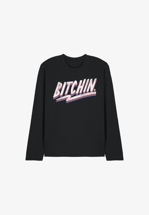 Black long-sleeve shirt with the word "BITCHIN." in large, distressed white letters outlined in red and blue across the chest.