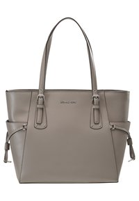Sac fourre-tout en cuir gris avec deux poignées supérieures, une forme structurée, des accents latéraux et des détails de logo à l'avant. Texture lisse.