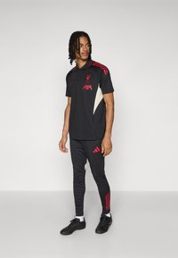 adidas Performance LIVERPOOL FC TIRO 25 COMPETITION TRAINING PANTS - Article de supporter d'équipe de club - black