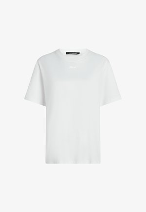 Λευκό κοντομάνικο μπλουζάκι με στρογγυλή λαιμόκοψη και μικρό λευκό κεντημένο λογότυπο κειμένου κάτω από τον γιακά, με ετικέτα Karl Lagerfeld στο εσωτερικό μέρος του λαιμού.