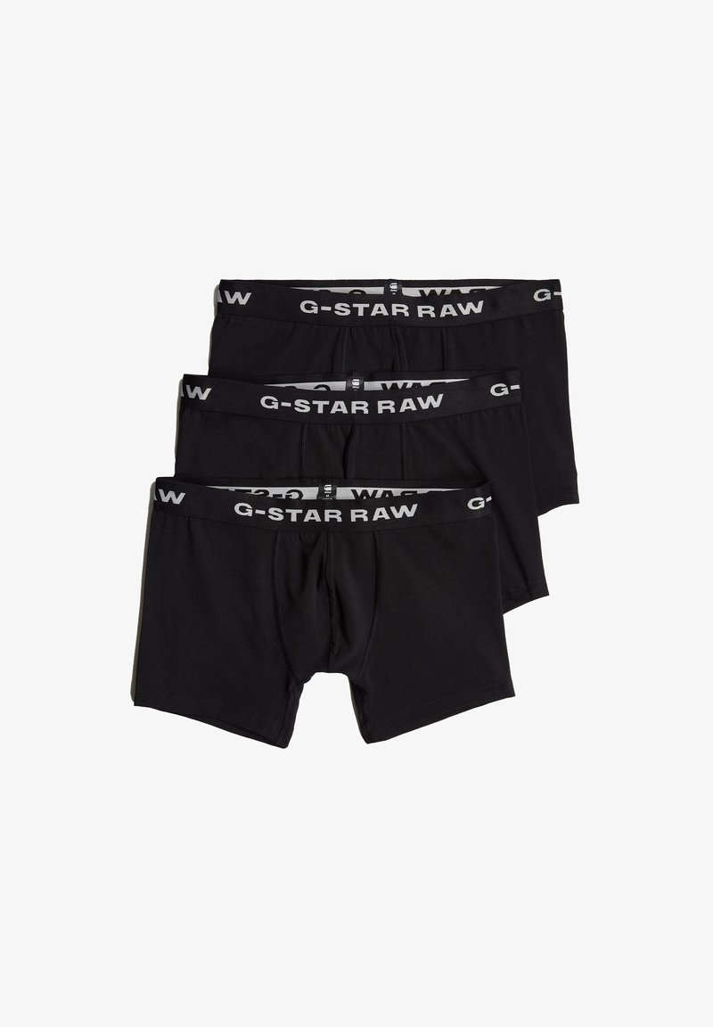 Svarta bomullsboxershorts, tre-pack, med G-Star RAW-logotyp på linningen. Mjuk textur, åtsittande passform och längd till mitten av låret.