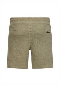 Pantaloni shorts color khaki con un motivo testurizzato, cintura elastica, due tasche posteriori e un piccolo etichetta nera sul taschino destro.
