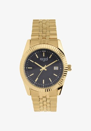 Goudkleurig horloge met een geribbelde lunette, zwarte wijzerplaat, gouden uurmarkeringen en datumaanduiding. Metalen schakelarmband, gepolijste afwerking, klassiek ontwerp.